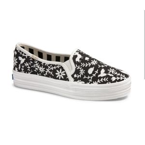 Women's Black and White Slip-On Sneakers